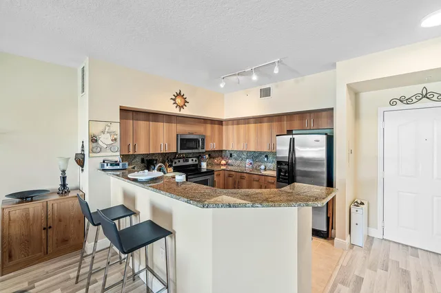 Pineapple Grove Village Condominiums Unit 315 photo 26