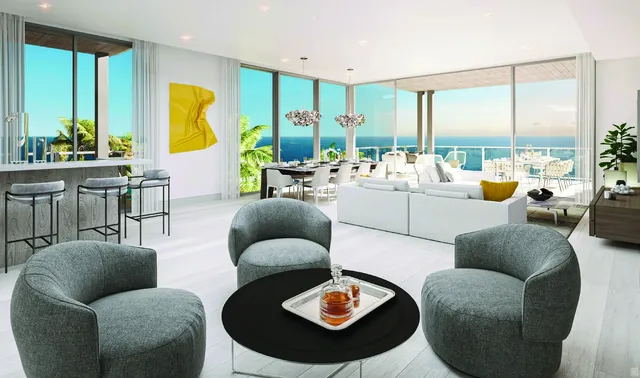 Great room with floor-to-ceiling glass and ocean views